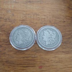 2 Morgan Silver Dollars 1900 $50 Each.