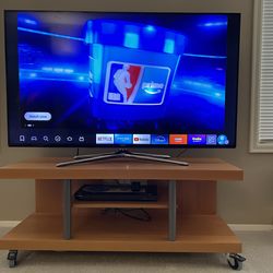 Samsung 55” LED TV + Sturdy TV stand with wheels