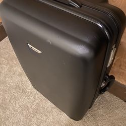 Delsey suit case