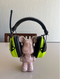 Howard Leight by Honeywell Sync AM/FM Radio Ear Muffs ā Hi-Vis Green