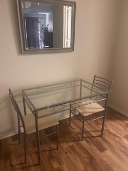 Stoufenberg 4 Person Glass Top Table 2 Chairs.