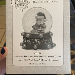 Precious moments snow globe with music