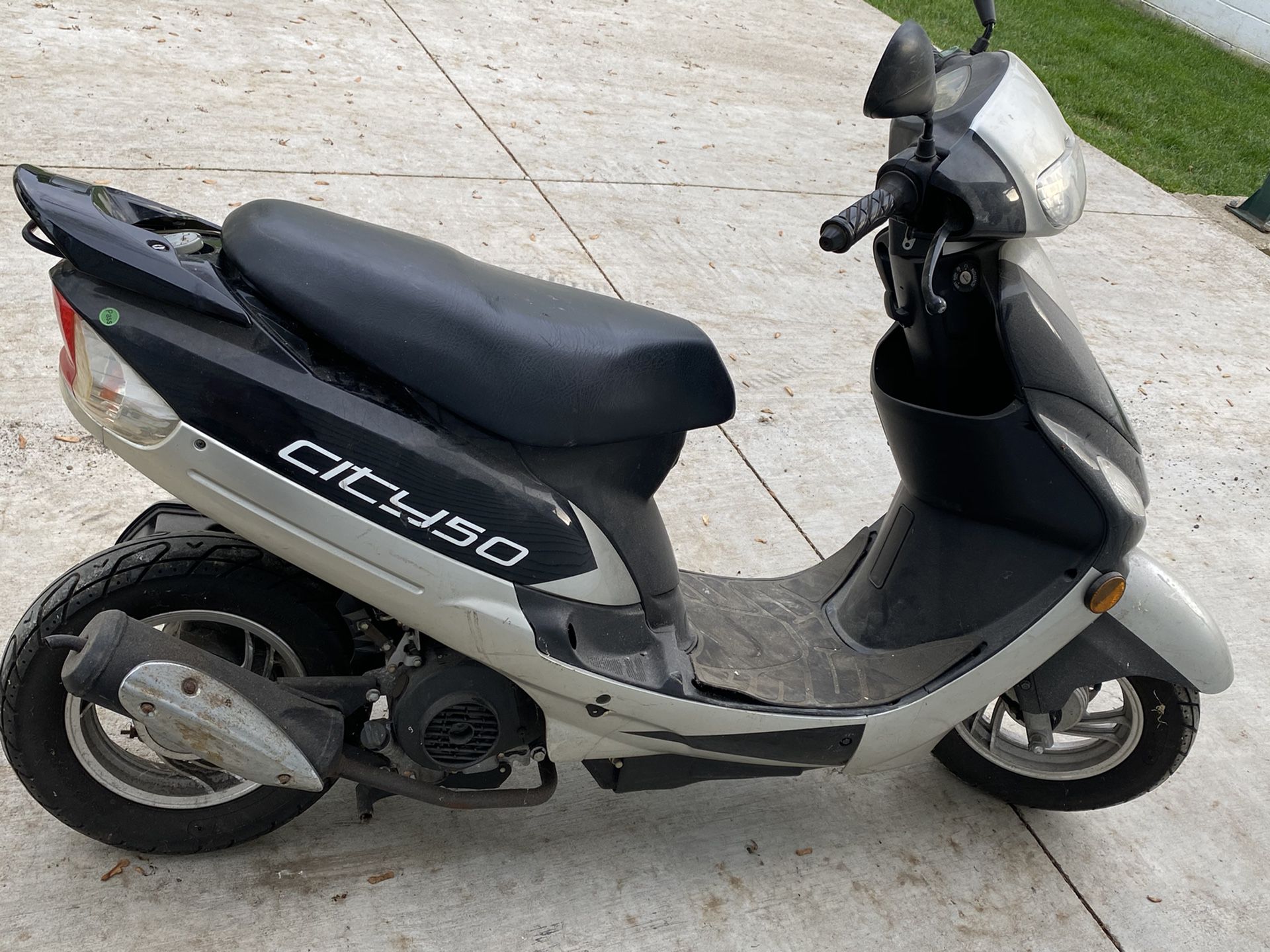 It is a city 50 has a top range of about 70, only has 507 miles on it. Tires aren’t worn at all everything is in good shape. I’ll take 1500 for it