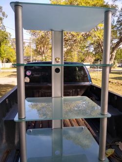 Tall glass entertainment center
