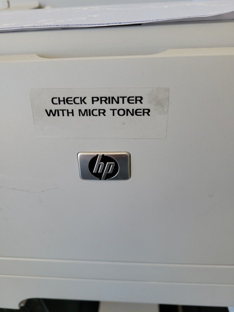 CHECK PRINTER WITH MAGNETIC TONER