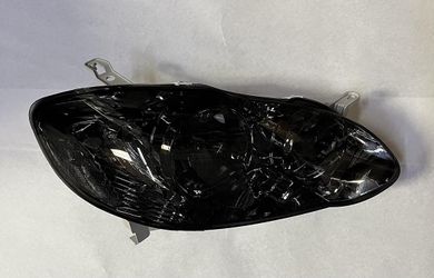 LA Zona Auto Parts 03 to 08 Toyota Corolla Right Side Passenger Headlight Smoked lens 