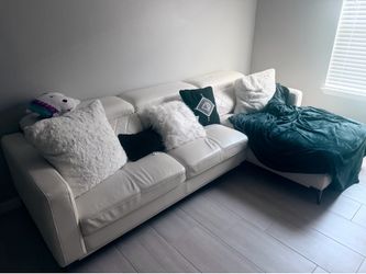White sofa sectional + ottoman