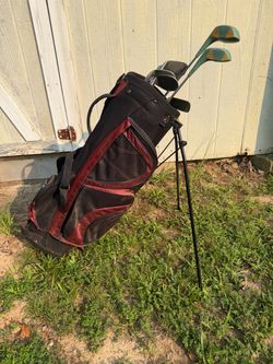 Golf clubs an bag with stand