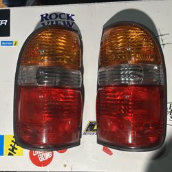 OEM Toyota Tacoma Tail Lights 1998–2004 (Pair)