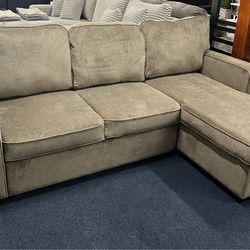 Warm grey reversible sleeper sectional w/ storage