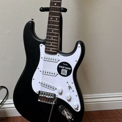Like New Squier Stratocaster Guitar By FENDER 