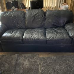 2 Leather  Sofa’s