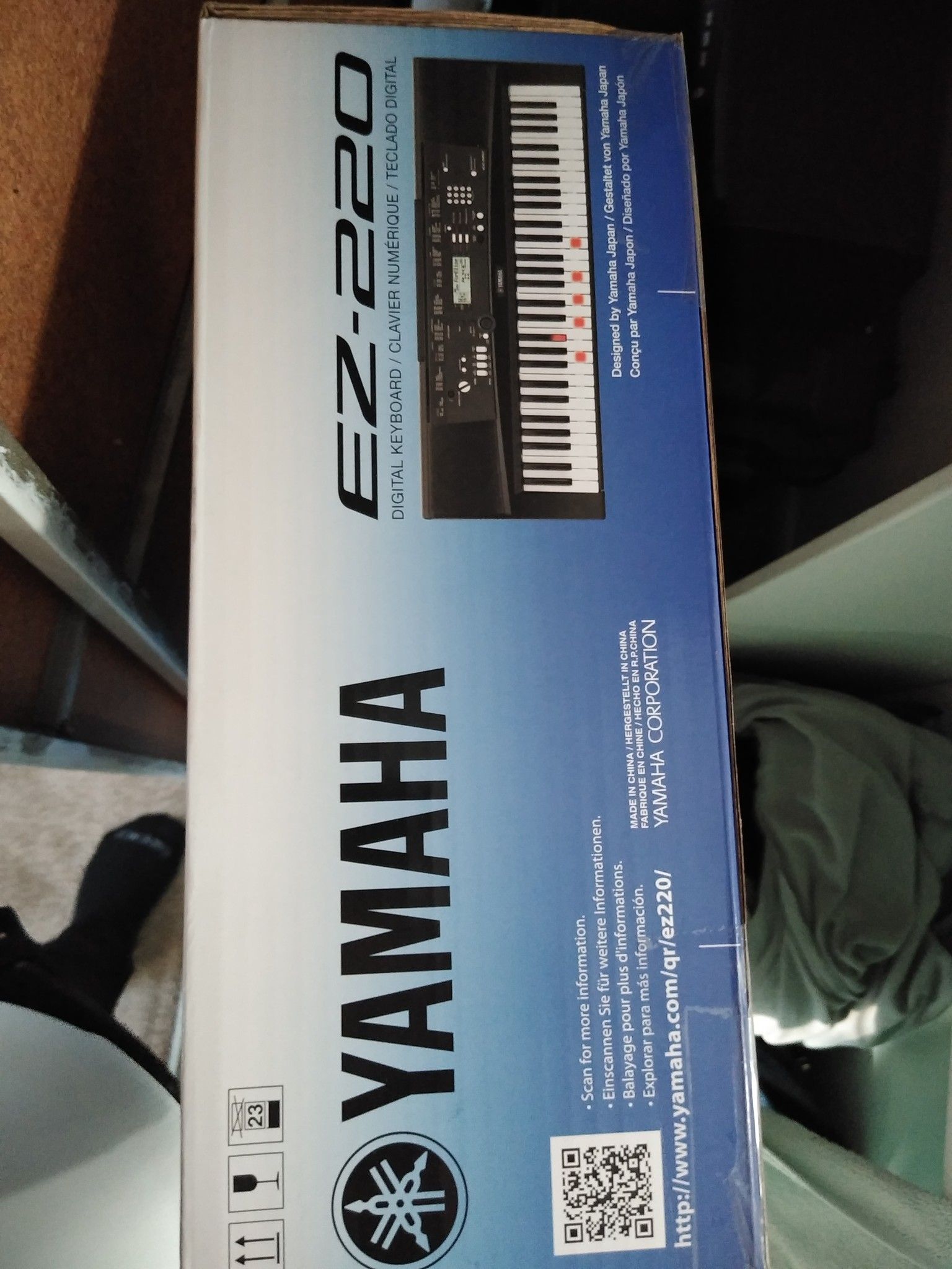 Brand spanking Yamaha ez220 with headphones stand and amp all never used still in box