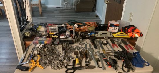 Large assortment of tools, 50 Ft and 6 ft extension cords, and miscellaneous items. Craftsman, Task Force and different makes. Wireless Rotary Tool an
