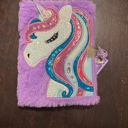 Brand new Claire’s unicorn notebook