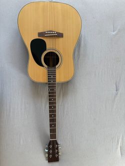Acoustic Guitar $100