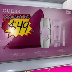 Guess Woman Eau de Parfum 4 Piece Gift Set - Perfume Spray 2.5 Fl. Oz., Travel Size Perfume Spray 0.5 Fl. Oz., 3.4 Fl. Oz. Body Lotion, & Pouch