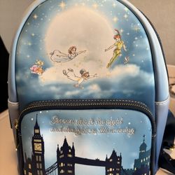 Peter Pan Loungefly backpack and matching wallet
