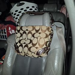 Authentic  Coach Pocket Book