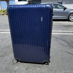 RIMOWA BLUE SUITCASE (Broken Wheel)