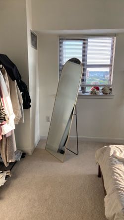 arched mirror with golden rim