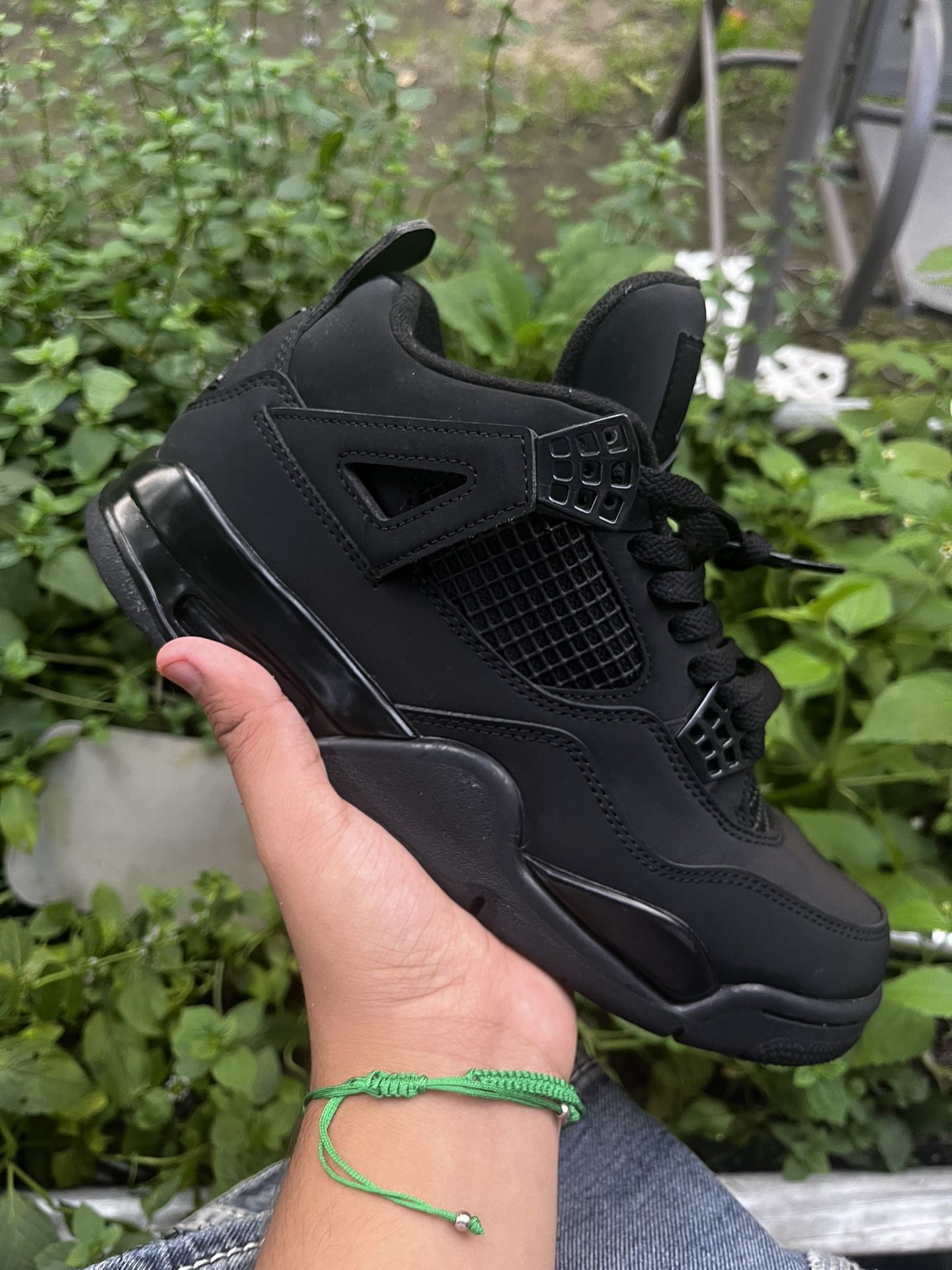 Black Cat Jordan 4s