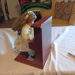 Vtg. Porcelain Piano Playing Doll