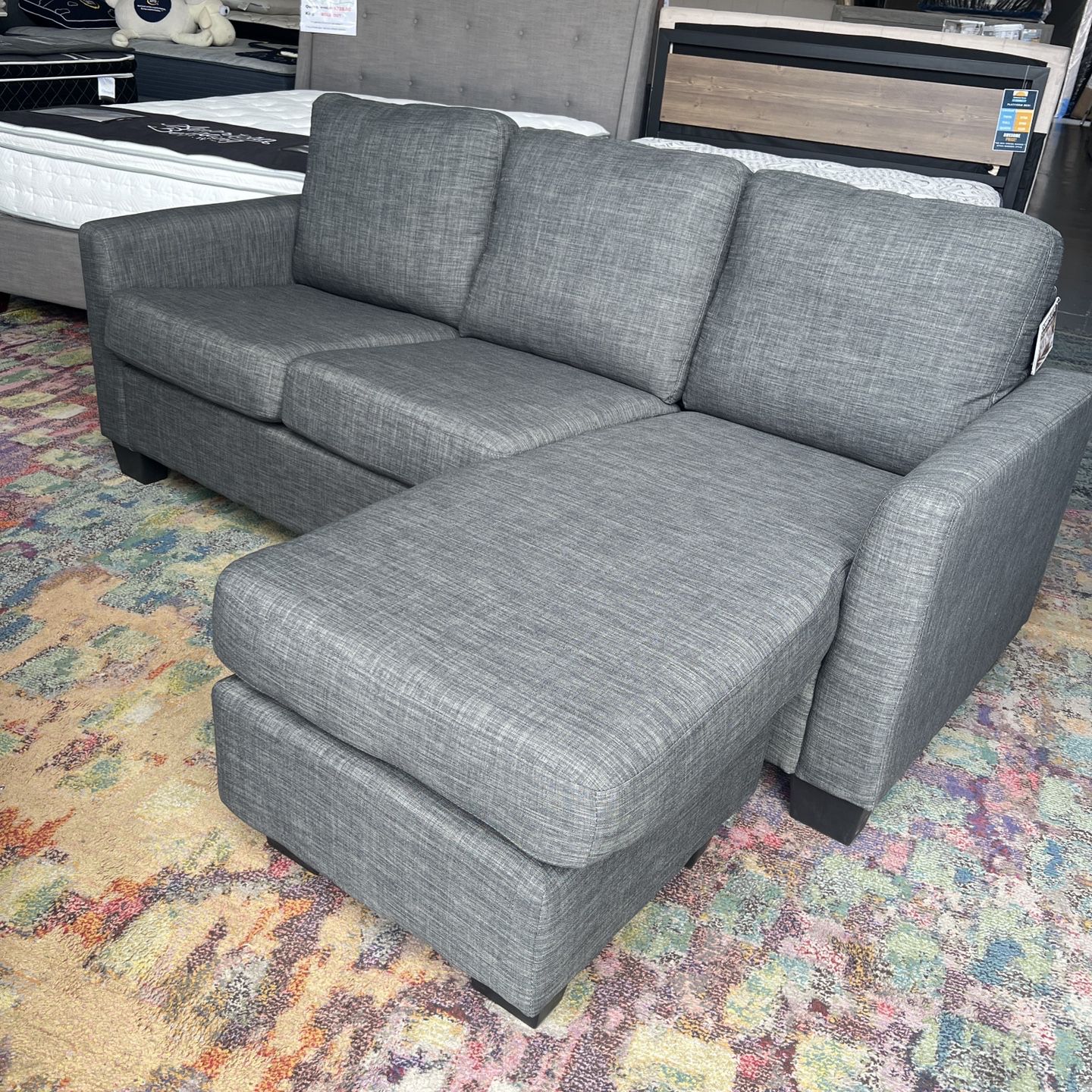 BRAND NEW- In The Box Charcoal Sectional With Reversible Chaise Great price 