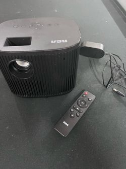 RCA Home Projector with Remote and Power Cable but u gotta come get it tho