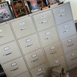 Heavy-duty metal filing cabinets for sale. Multiple available.