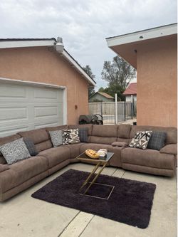 Brown sectional recliner couch