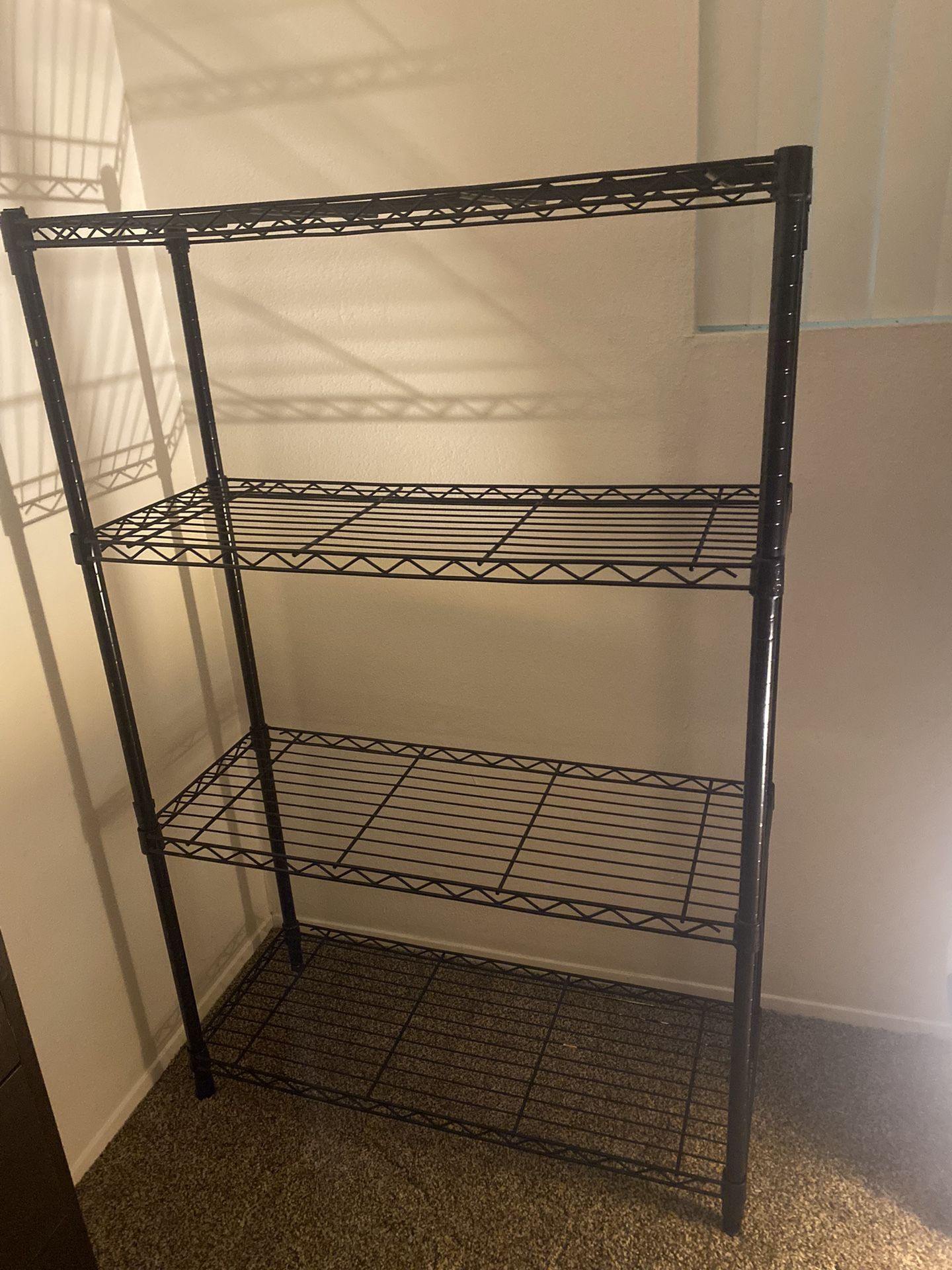 Four Layers of Black Rack for Closet-Height=55” inches X 35” inches Width