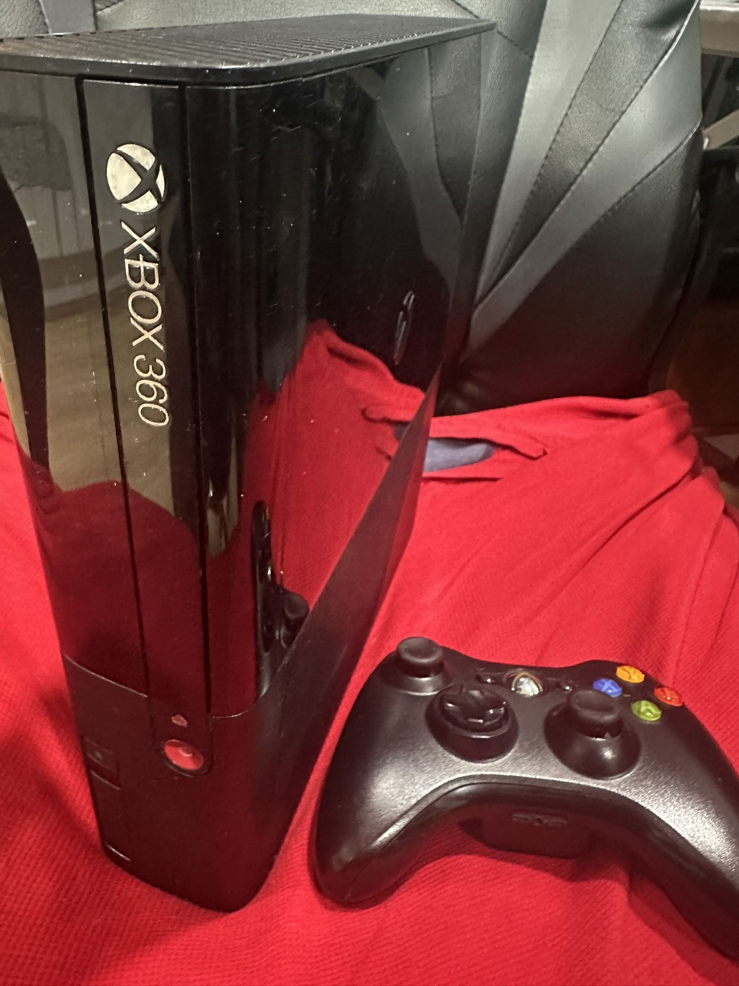 Xbox 360 E console with 16 games