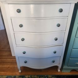 White Dresser with Decorative Knobs