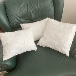 Three White Decorative Pillows