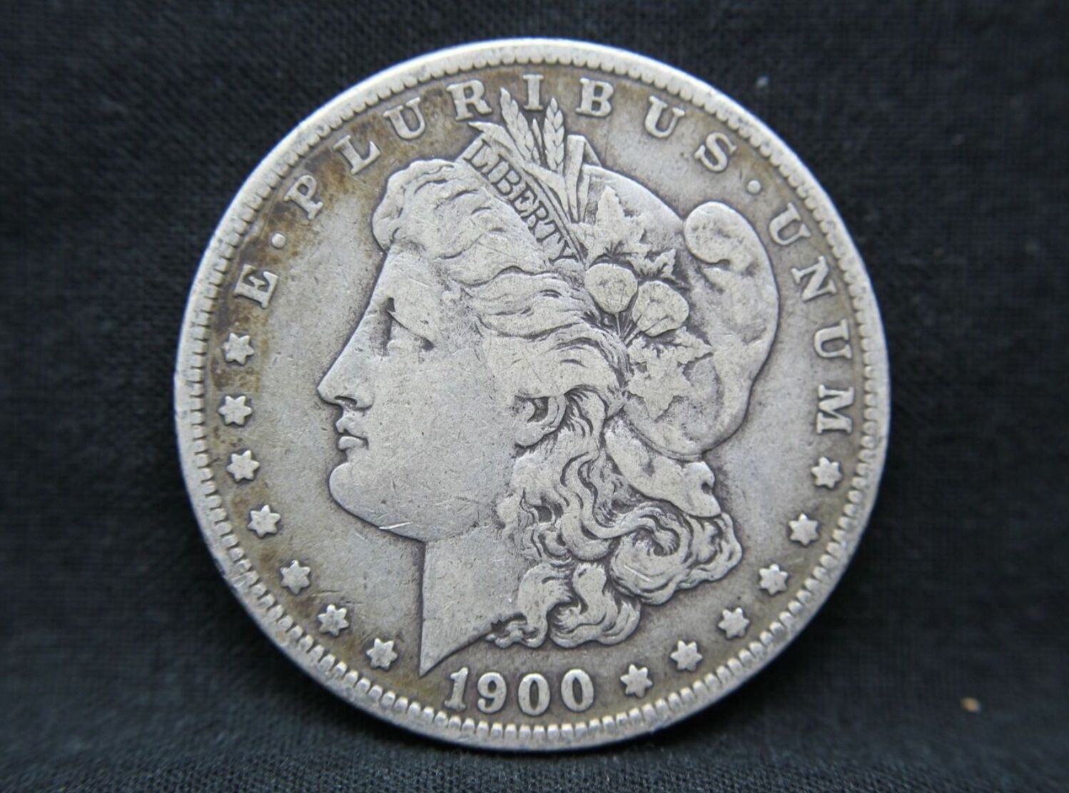 1900 O 90% Silver Morgan Dollar (55)