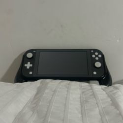 Nintendo Switch Lite With Case And Games