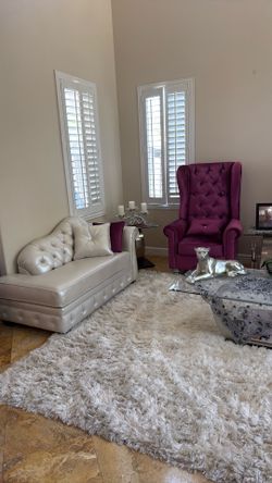 Purple armchair and white couches
