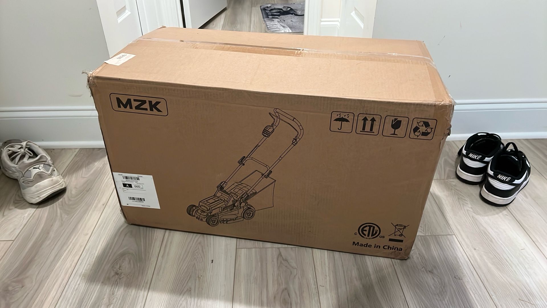 cordless battery operated lawn mower