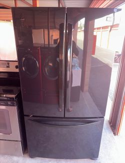 Black LG Refrigerator And Freezer