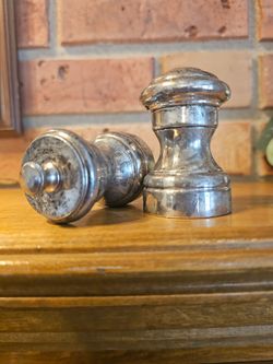 Vintage silver pepper grinder and salt shaker