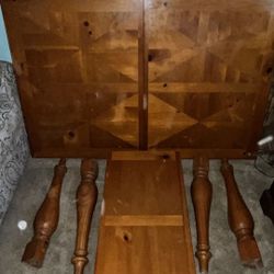 Wooden dining table, chairs, and an extra table keaf