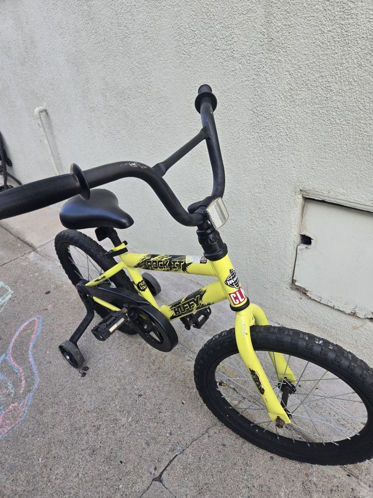 Kids Huffy bike with quick release training wheels asking 40