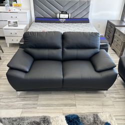 Floor Model. Valencia Black Loveseat Only $299. Same Day Pick Up Or Delivery Available.