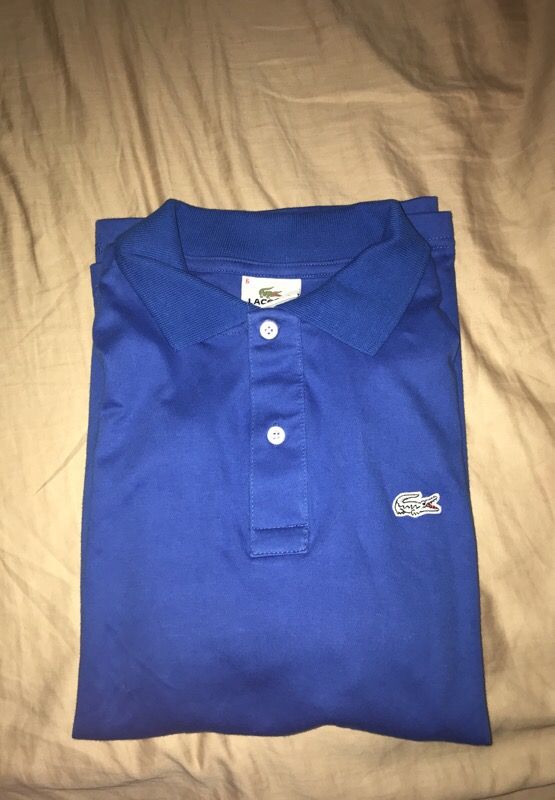 Brand new Lacoste blue polo size large