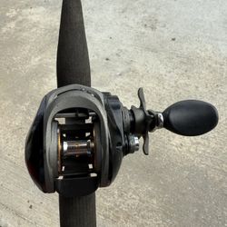  Ass Pro Shops Mega Cast MG1OHA bait caster on 5’5” Berkley rod #3