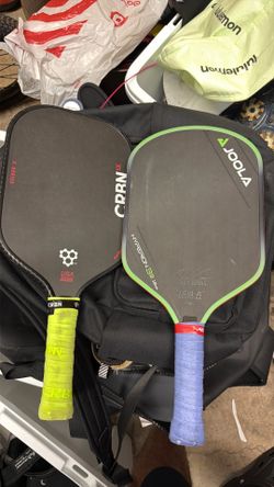 Pickleball paddles pro level used but great clean grips under over grip