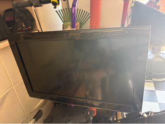 32” Toshiba TV with DVD player and Chromecast device.