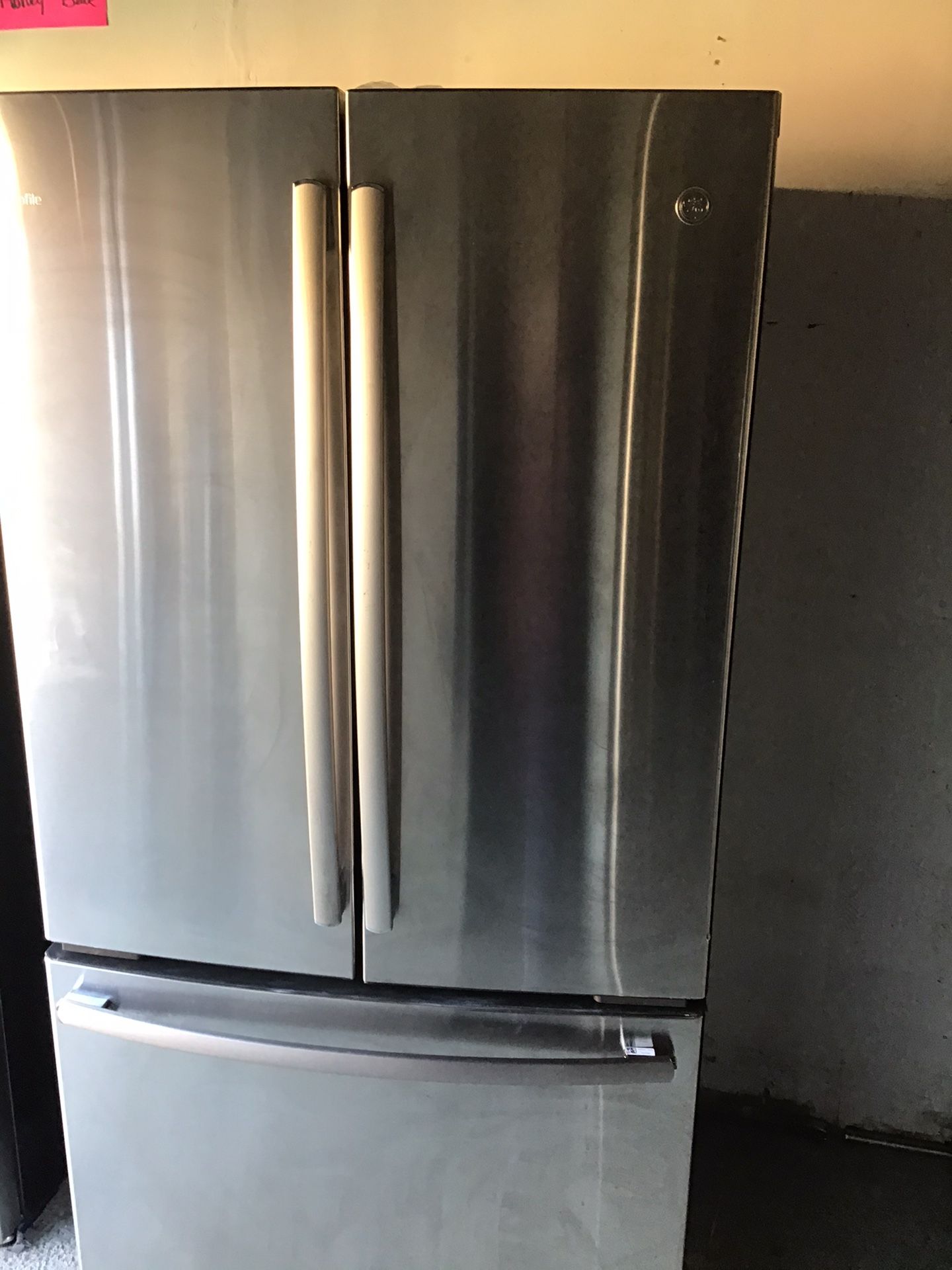 GE French Door Refrigerator w/ water and ice maker inside