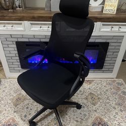 Highback black mesh office chair with headrest